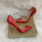 Red side air high heels on a display box, showcasing FashionFitz's glossy lacquer leather craftsmanship.