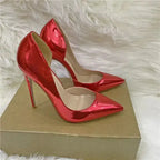 Red lacquer leather stiletto pumps displayed on a box, showcasing FashionFitz's luxury side air high heel design.