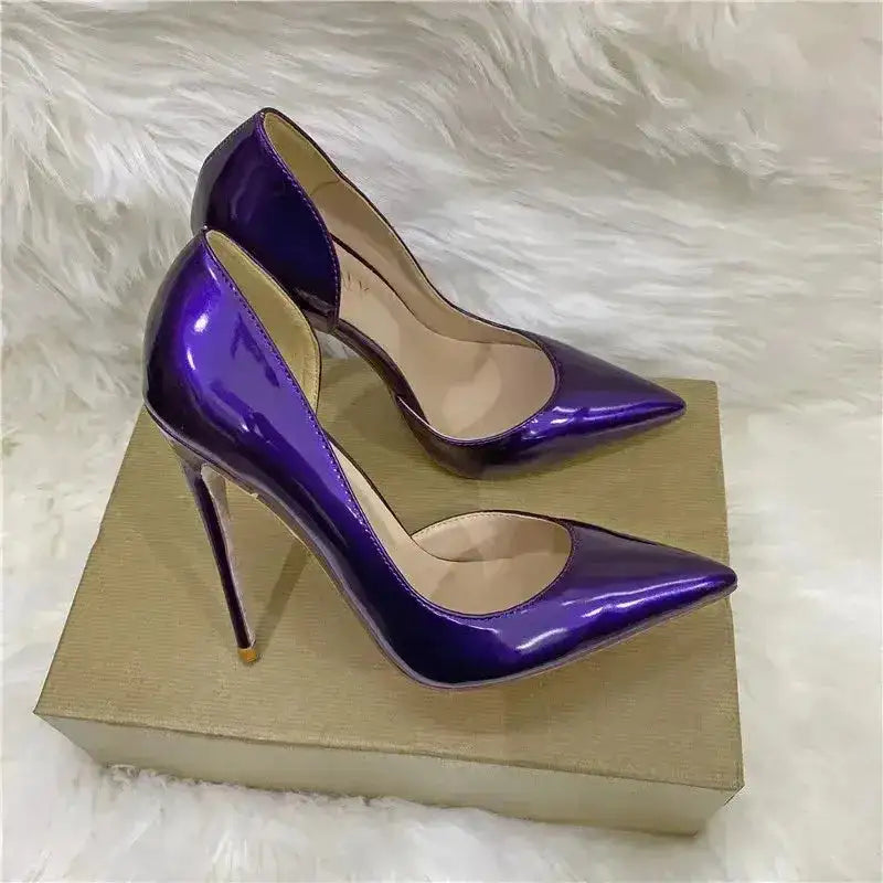 Purple lacquer leather stiletto pumps on a box, combining luxury and comfort with FashionFitz's side air design.