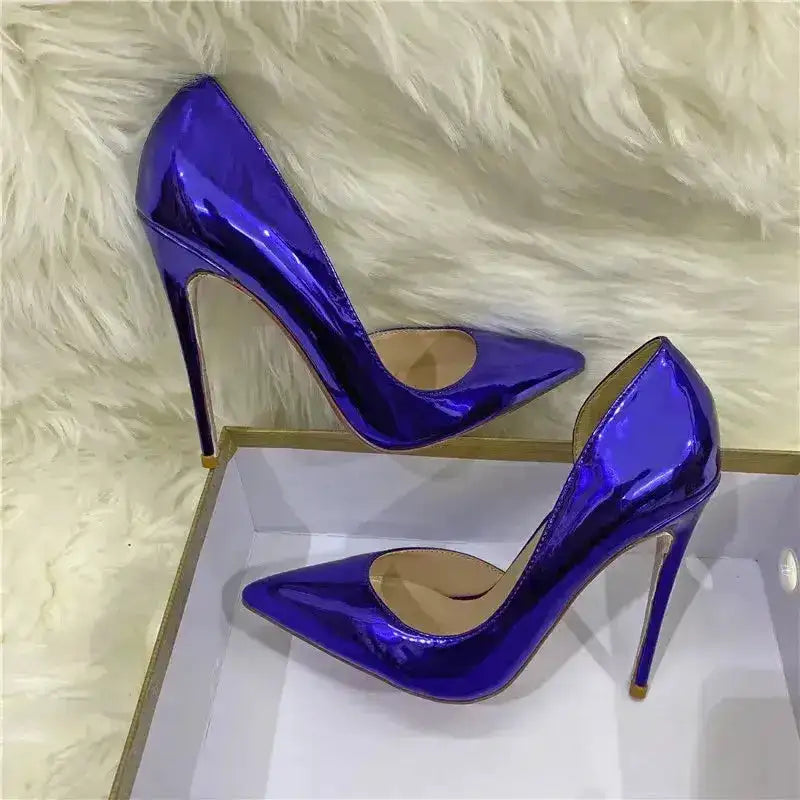 Metallic blue lacquer leather high heels with side air cut, presented in a box for premium fashion appeal.