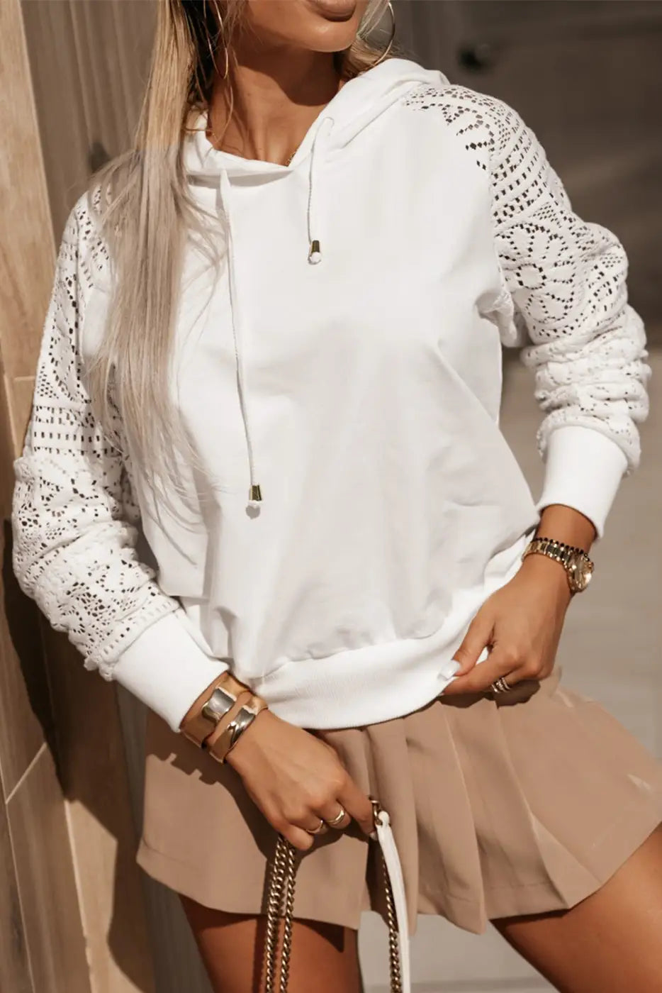 Lacy layers hoodie: white hoodie with lace-patterned sleeves and drawstring details