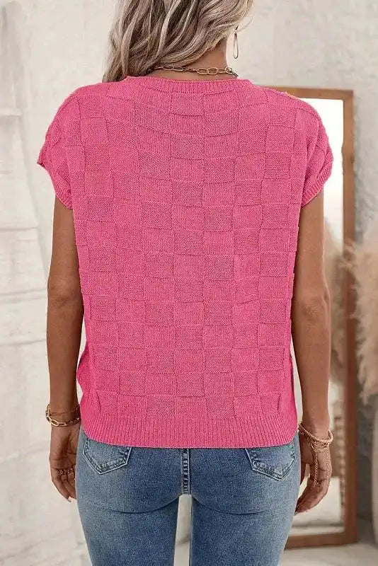 Back view of FashionFitz Lattice Short Sleeve Sweater in pink, showcasing the checkered knit texture and relaxed fit.