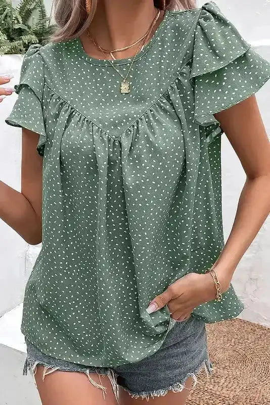 Side view of Polka Dot Ruched Blouse showing ruffle sleeve detail and lightweight polyester drape — Fashionfitz