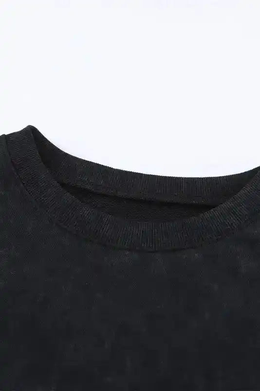 Close-up of crew neckline on Leopard Patchwork Bishop Sleeve Sweatshirt | Unique & Trendy, featuring ribbed collar detail.
