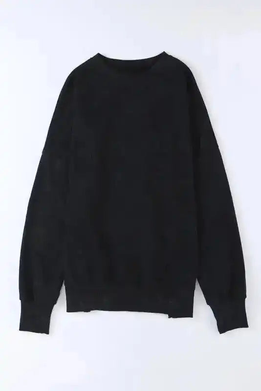 Flat lay of Leopard Patchwork Bishop Sleeve Sweatshirt | Unique & Trendy in black, displaying full front design and bishop sleeves.
