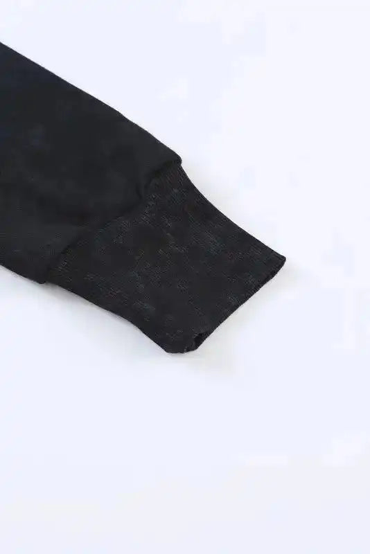 Zoomed-in sleeve cuff of Leopard Patchwork Bishop Sleeve Sweatshirt | Unique & Trendy, highlighting ribbed knit texture.
