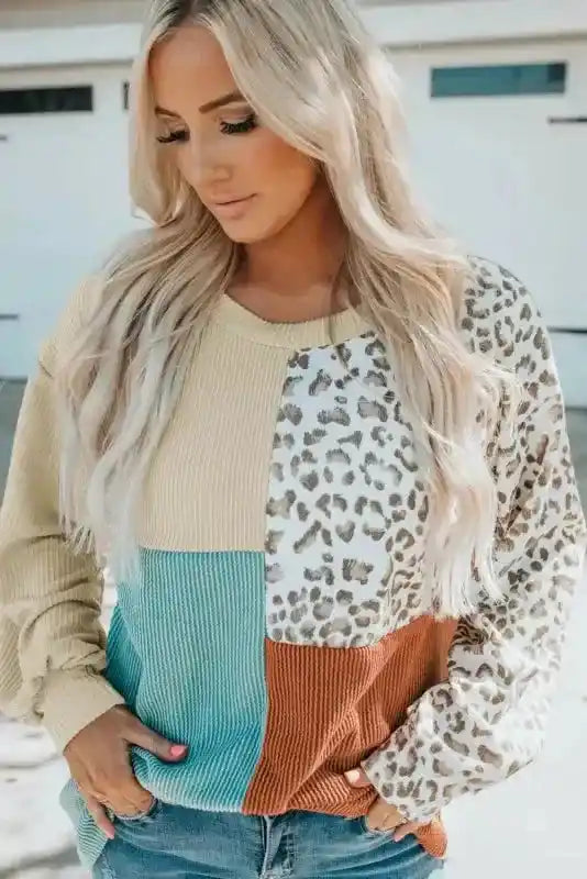 Southern Belle style long sleeve top with ribbed texture, leopard print patchwork, and color block pattern in autumn hues.