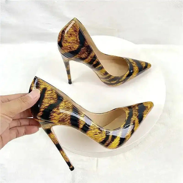 Trendy Leopard High Heels for Women Court Shoes with pointed toe and stiletto heel in glossy PU leather. Stylish pumps from FashionFitz.