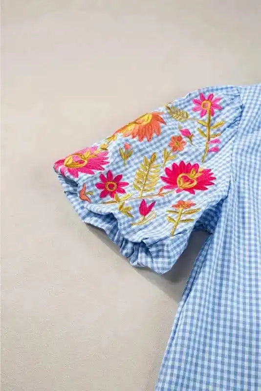 Light Blue Gingham Floral Embroidered Puff Sleeve Blouse styled as a romantic summer garden party outfit — Fashionfitz