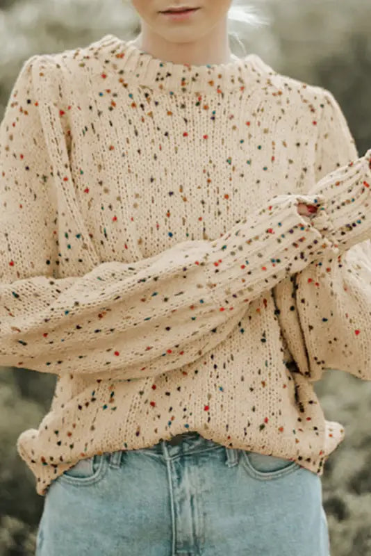 Light french beige colorful cable knit crew neck sweater over blue jeans. Relax relax!