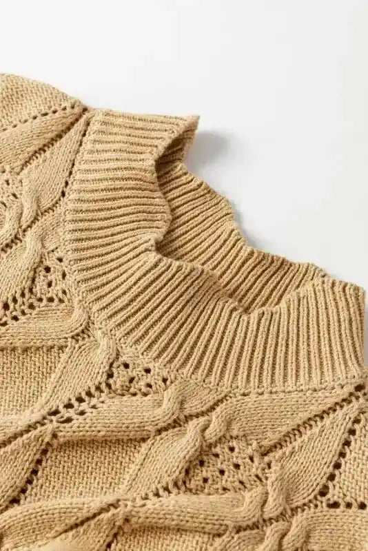 High neck ribbed collar detail on beige knit sweater with scalloped trim, crafted in a breathable cotton blend for winter wear.