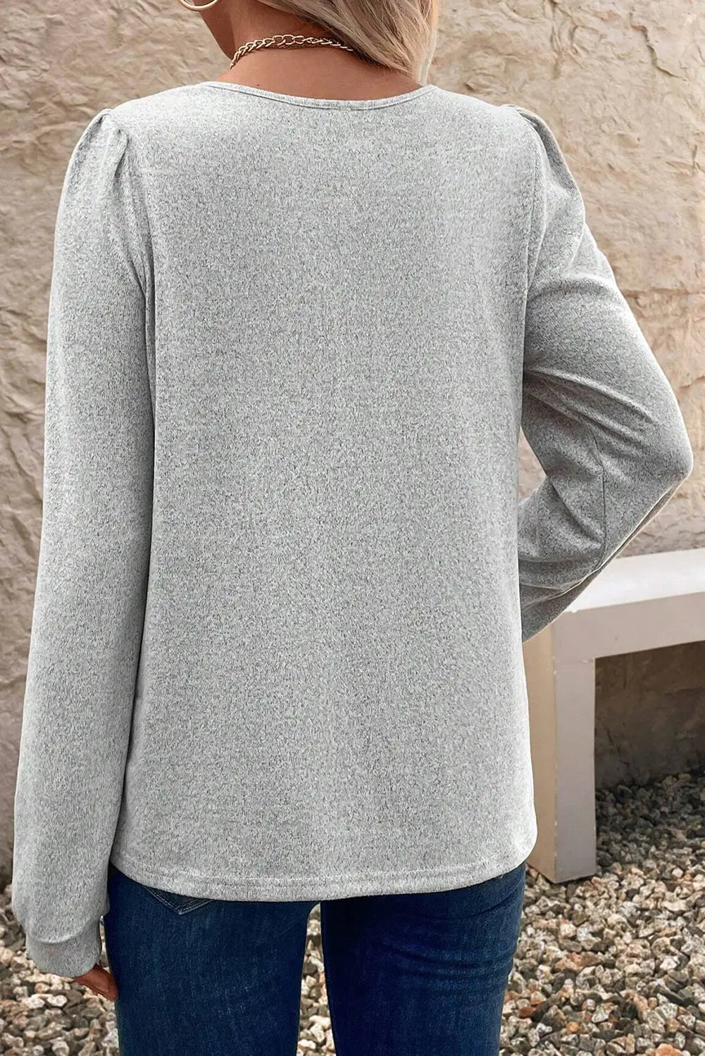 Light grey frilly notched neck button detail long sleeve top