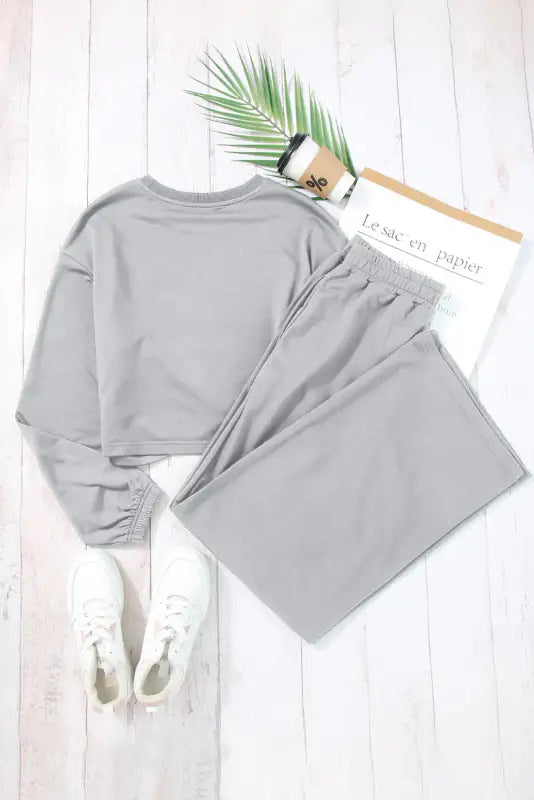 Light grey solid criss cross crop top and pants active set