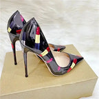 High-shine Lipstick Graffiti Heels with ultra-high stilettos and playful lipstick pattern, ideal for statement-making fashion lovers.