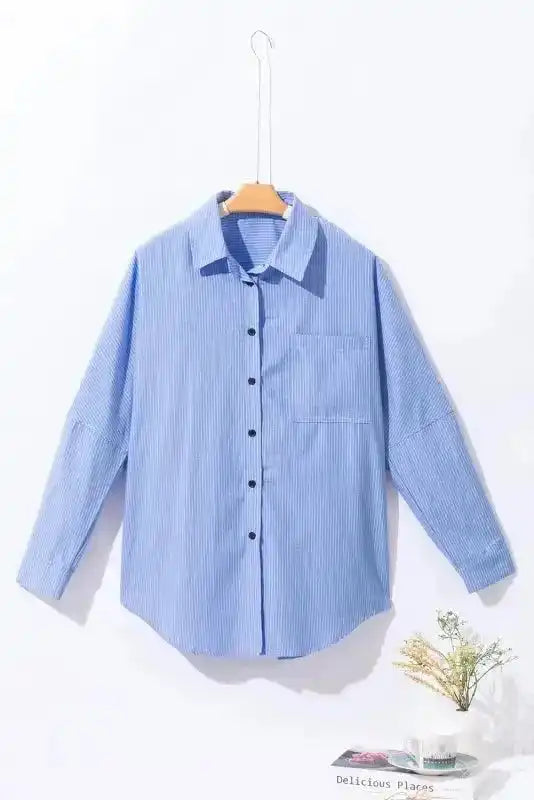 Side view of Sky Blue Striped Roll-Tab Sleeve Long Shirt showing roll-tab sleeve detail and generous shirt length — Fashionfitz