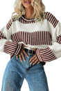 Model wearing brown striped jumper with relaxed fit and round neckline