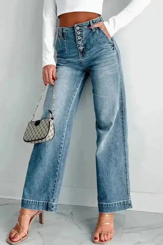 Woman wearing dusk blue wash loose leg straight jeans with high waist, front view, Fashionfitz UK