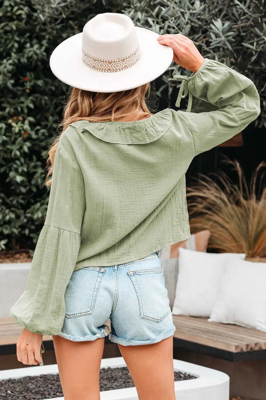 Back view of Green Cotton Bow Detail Meadow Blouse showing flowy sleeve silhouette and relaxed cotton fit — Fashionfitz