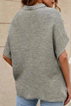 Back view of grey high neck short sleeve sweater showing relaxed fit and batwing silhouette. Perfect for casual autumn wear.