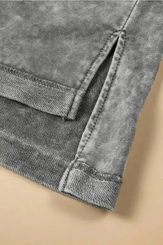 Close-up of Mineral Wash Patchwork Plus Size T-Shirt showing distinctive pink mineral wash patchwork detail — Fashionfitz