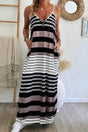 Woman wearing mixed stripe spaghetti strap maxi dress with V-neck, front view, Fashionfitz UK