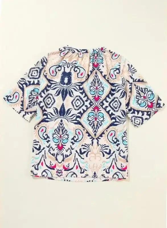 Close-up of Loose Fit Notch Neck Boho Holiday Blouse showing modern notch V-neckline detail — Fashionfitz