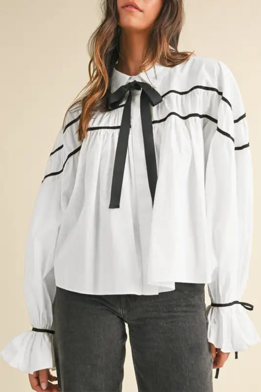 Monochrome elegance bowtie blouse