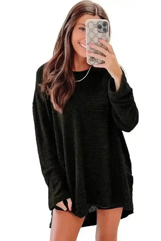 Front view of Plus Size Moss Green Knit Top styled with phone accessory, showcasing its casual and cozy fall design.