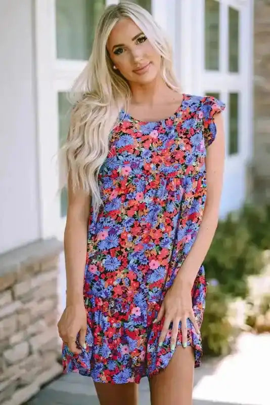 Floral babydoll top for women in vibrant pink, red, and blue hues with ruffle short sleeves, perfect for summer casual wear.