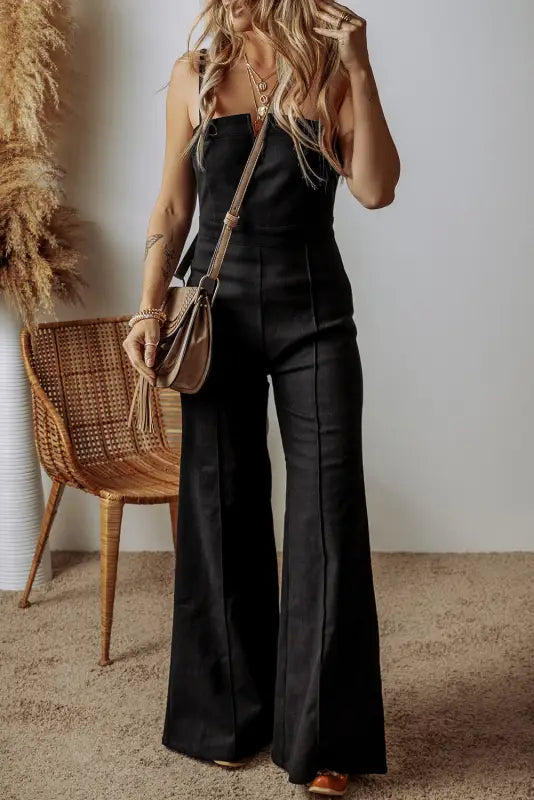 Noirflare: chic black high-waist flared jumpsuit | fashionfitz