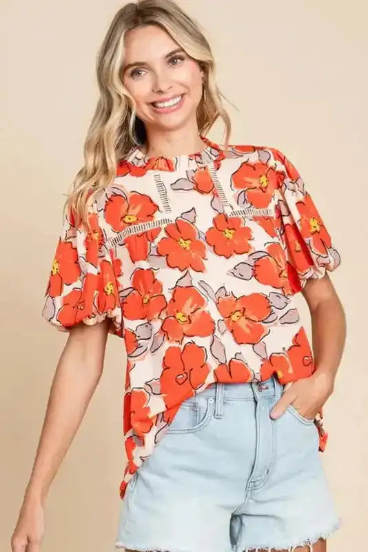 Close-up of Orange Floral Loose Blouse showing stand frilled collar and hollow-out cutout trim detail — Fashionfitz