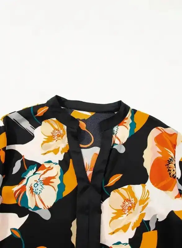 Neckline detail of Orange Floral Tie Neck Dress with soft fabric and floral print, ideal for stylish comfort.