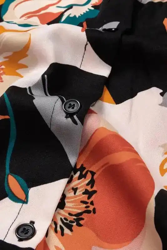 Detail of button placket on Orange Floral Long Sleeve Dress with vibrant floral design, emphasizing quality and craftsmanship.