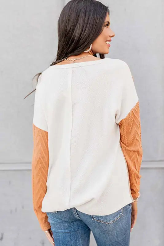 Orange long sleeve colorblock chest pocket textured knit top - tops