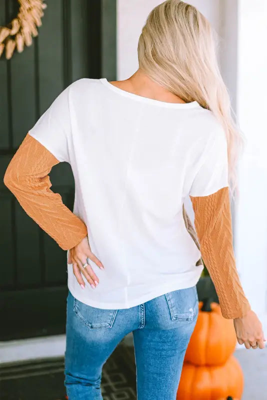 Orange long sleeve colorblock chest pocket textured knit top - tops