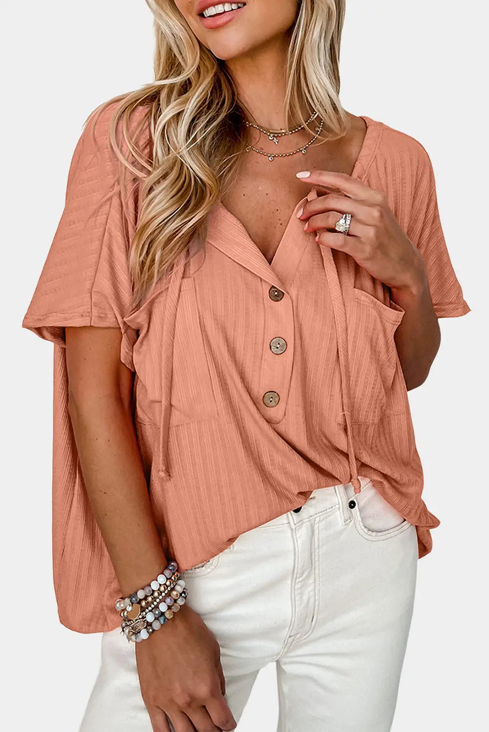 Orange notched v neck buttoned front textured loose top - t-shirts