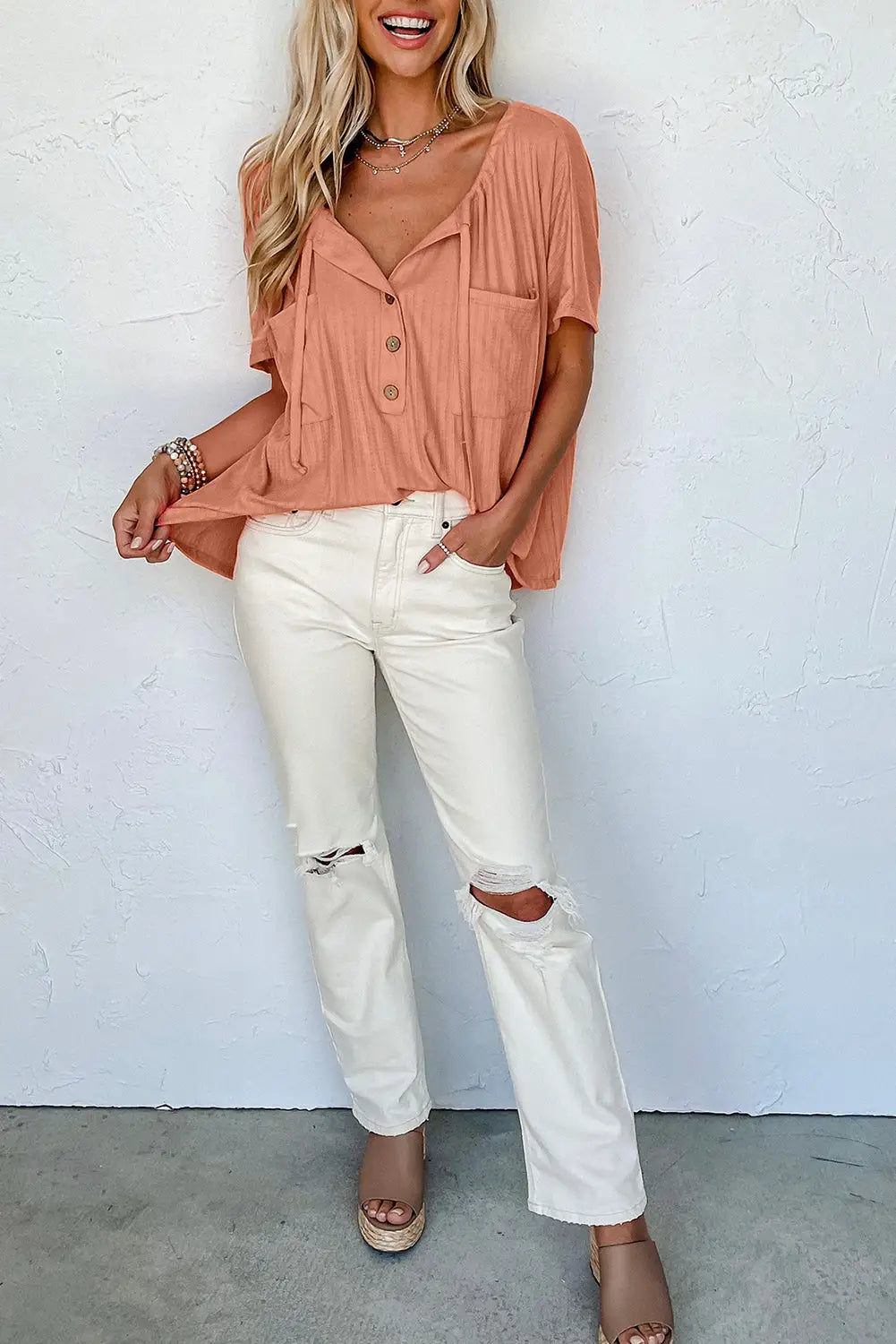 Orange notched v neck buttoned front textured loose top - t-shirts
