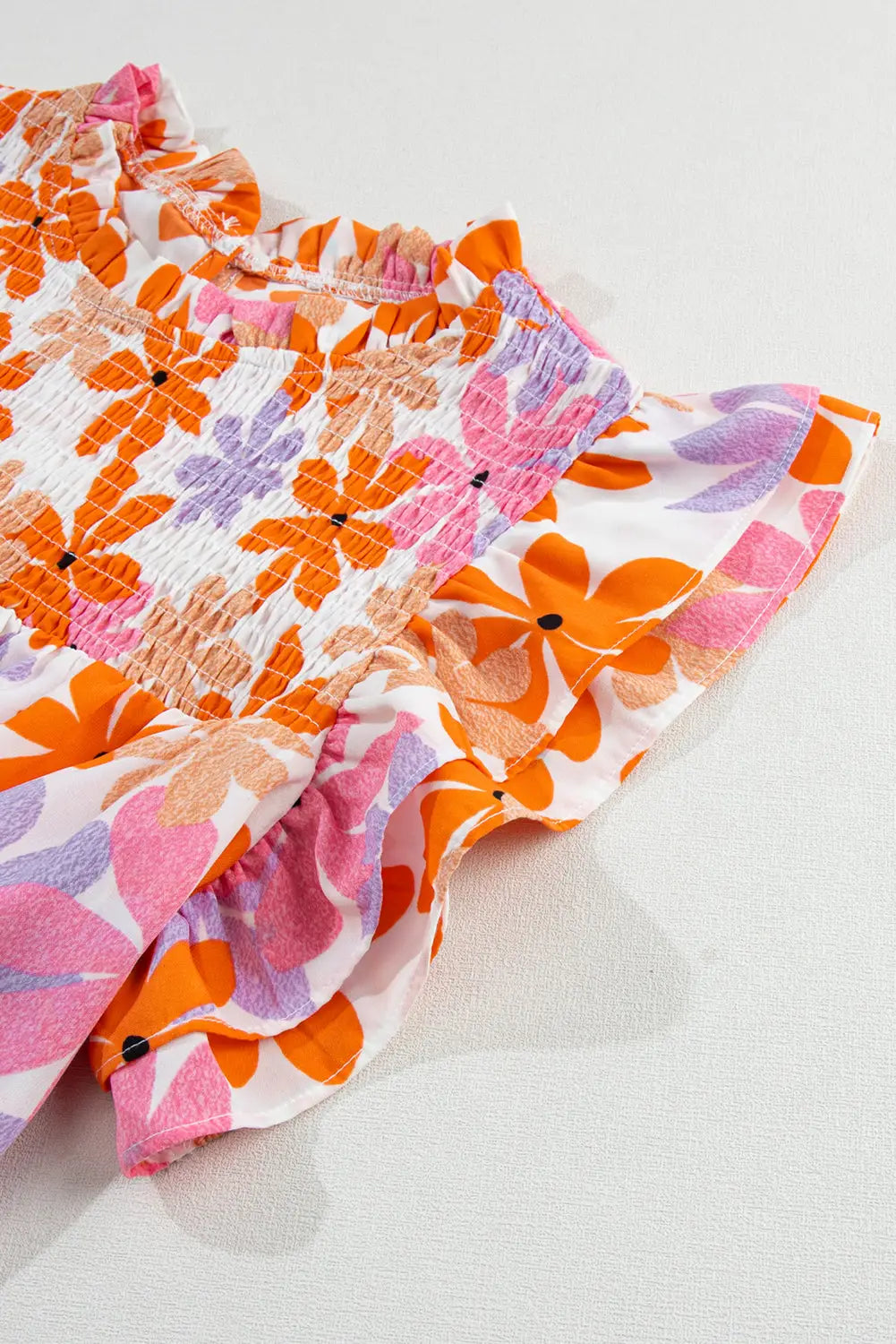 Orange ruffled sleeve smocked floral top - tops