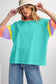 Oversized stitched top: colorful teal body and multicolored sleeves for a relax relax style