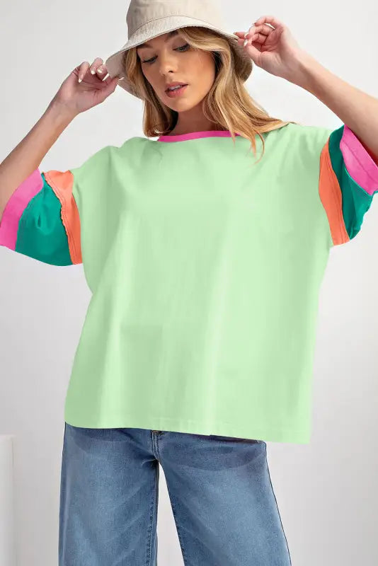 Mint green oversized stitched top with colorful accents for a relax relax outfit