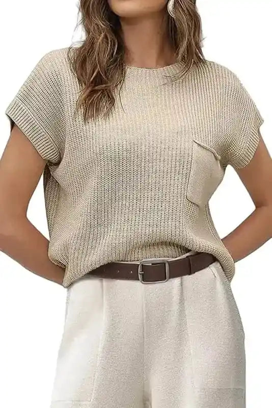 Front view of Pale Khaki Patch Pocket Short Sleeve Sweater tucked into high-waisted pants, ideal for daily casual wear.