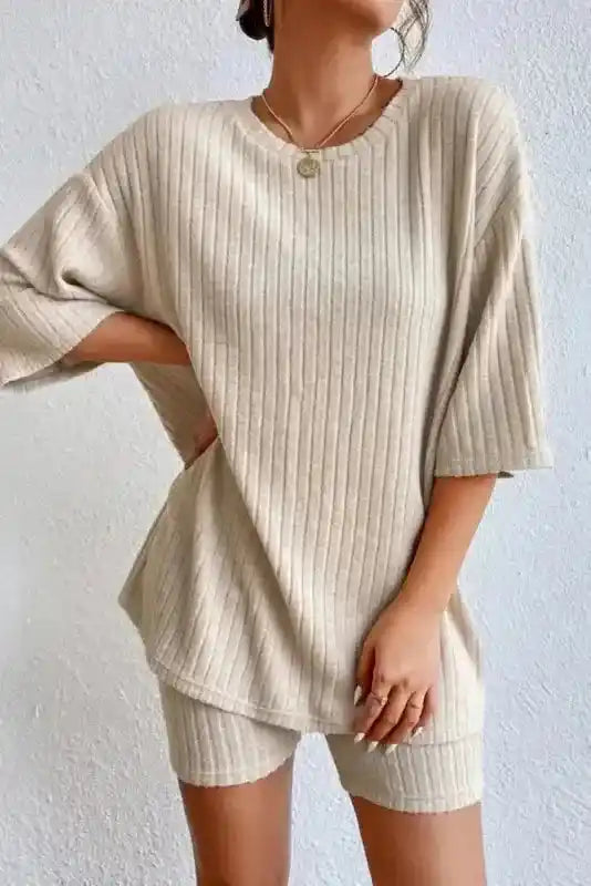 Beige ribbed short sleeve top and shorts set in plus size, designed for casual comfort with high stretch fabric.