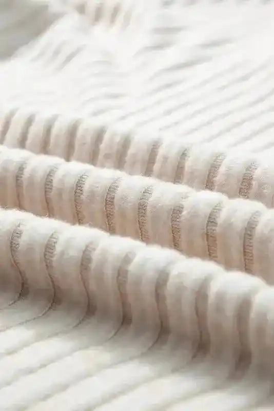 Macro shot of ribbed fabric texture on Plus Size Pullover Pants Set emphasizing soft, stretchy material and vertical ribbing.