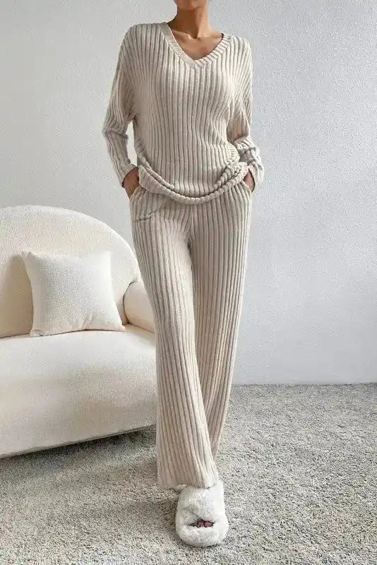 Plus size ribbed V-neck pullover and pants set in beige, designed with wide-leg fit and cozy stretch for casual home lounging.