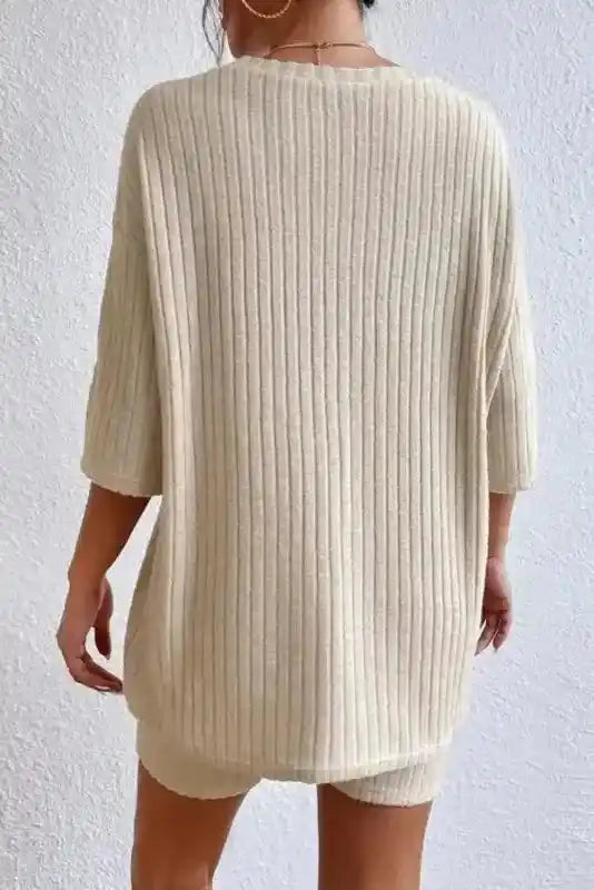 Back view of beige plus size ribbed short sleeve top and shorts set, ideal for home lounging and daily wear.
