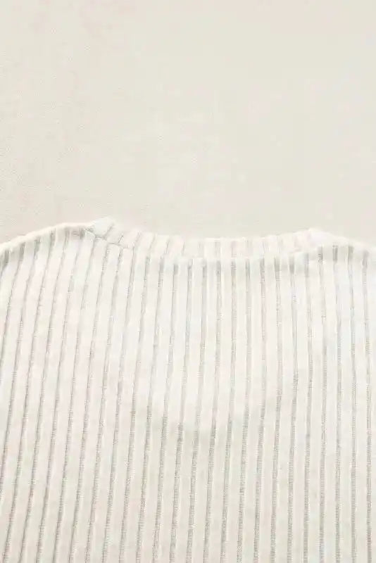 Back neckline of Plus Size Ribbed V-Neck Pullover showcasing fine ribbed knit and seamless finish for a clean look.