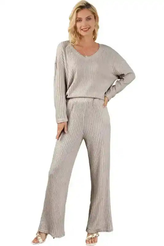 Full view of light gray ribbed V-neck pullover and pants set in plus size, designed for comfort with wide-leg and soft knit fabric.