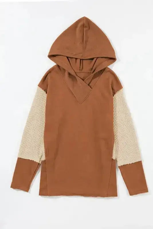 Flat lay of solid brown Patchwork Hoodie with textured knit sleeves and hooded neckline, part of the oversized textured knit collection.