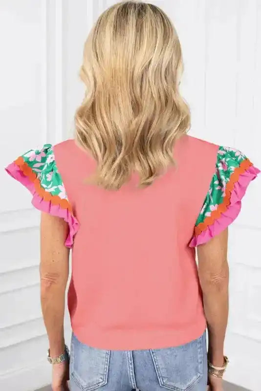 Back view of Peach Blossom Floral Sleeve Blouse showing contrast ricrac braid trim and relaxed silhouette — Fashionfitz