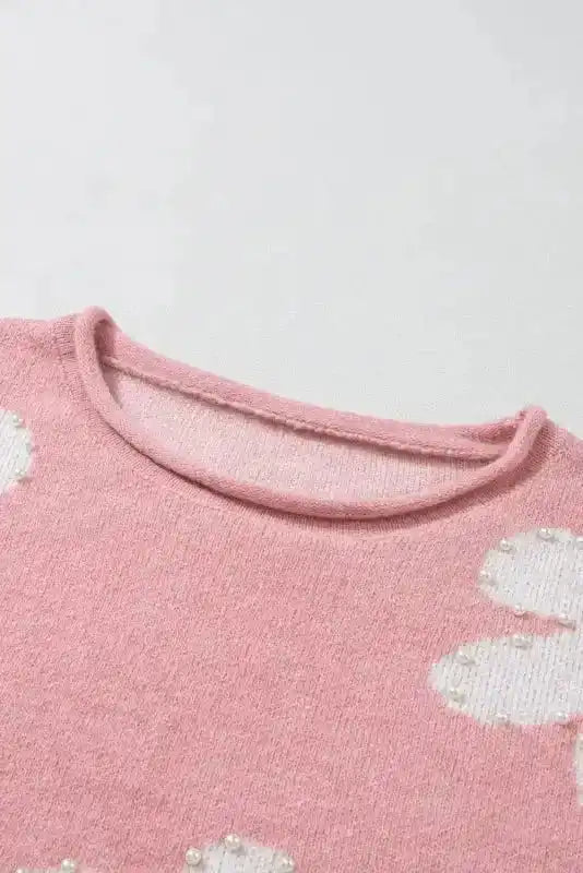 Neckline detail of Ladies Pink Pearl Beaded Floral Sweater by FashionFitz, showing round collar and floral pearl accents.